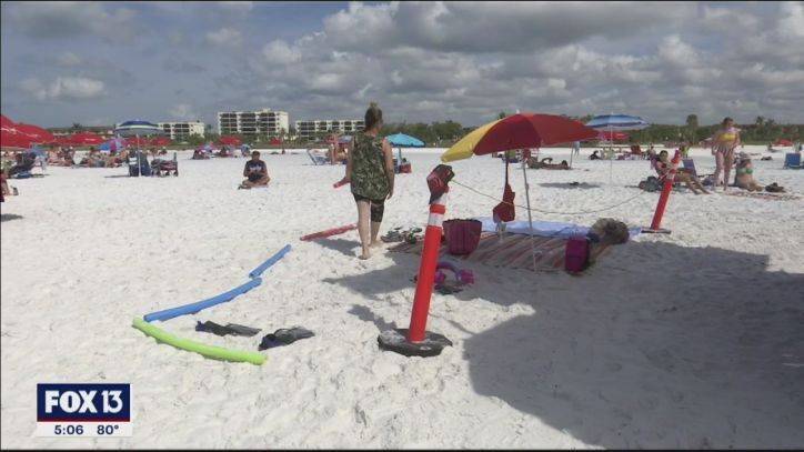 Justin Jones - Beachgoers draw circles in the sand, use pool noodles to create social distance - fox29.com - state Florida - state Tennessee - county Miami - county Pierce