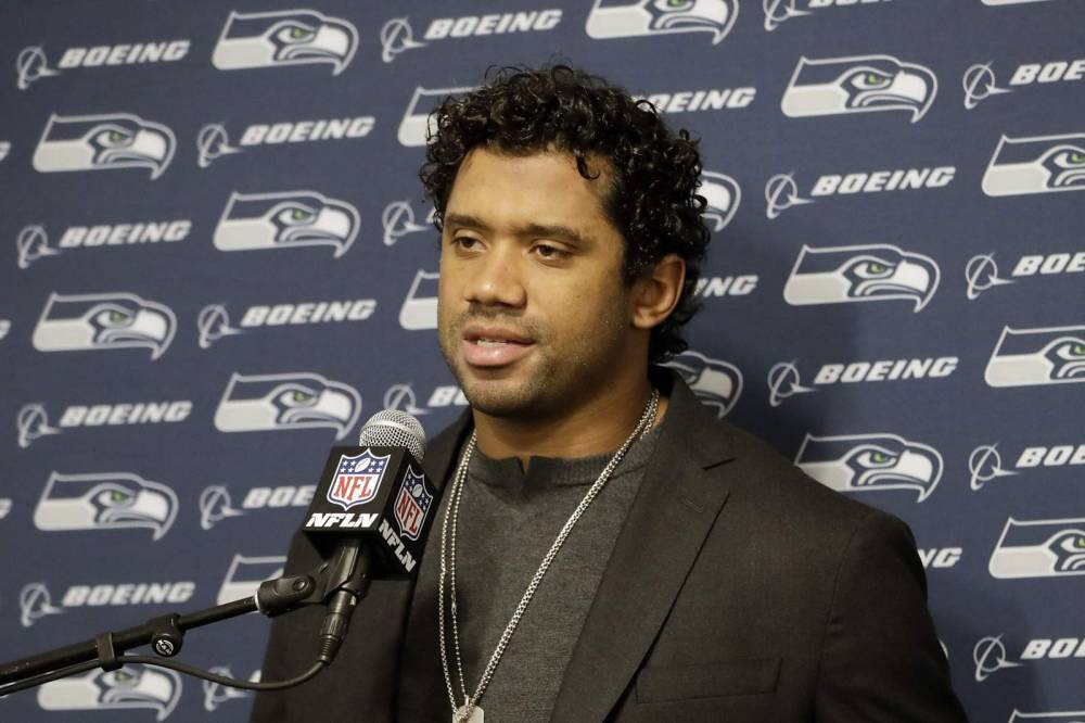 Russell Wilson - The Latest: Russell Wilson, Ciara donating 1 million meals - clickorlando.com - city Seattle
