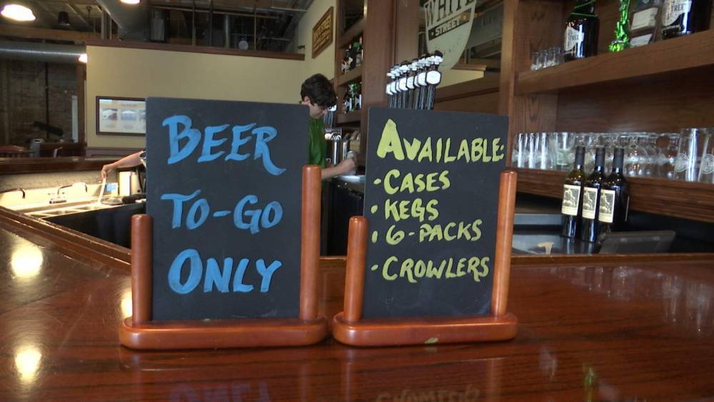 Fighting fear with beer: Virus spurs curbside beer sales - clickorlando.com - state North Carolina - county Wake - county Forest