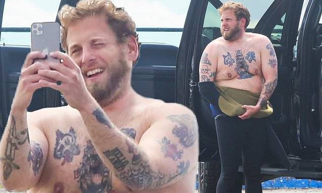 Jonah Hill pulls down his wetsuit in Malibu to show off his bare chest - dailymail.co.uk - state California - city Santos - city Malibu, state California