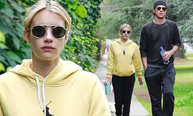 Emma Roberts - Julia Roberts - Emma Roberts dons sweatpants and a yellow hoodie for casual LA stroll with beau Garrett Hedlund - dailymail.co.uk
