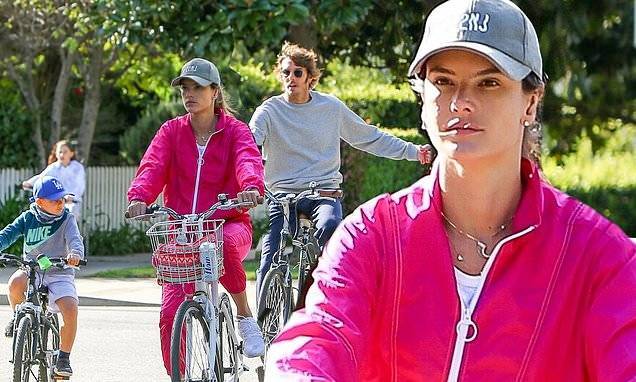 Alessandra Ambrosio - Nicolo Oddi - Alessandra Ambrosio looks sporty in a pink tracksuit on bike ride with children and beau Nicolo Oddi - dailymail.co.uk