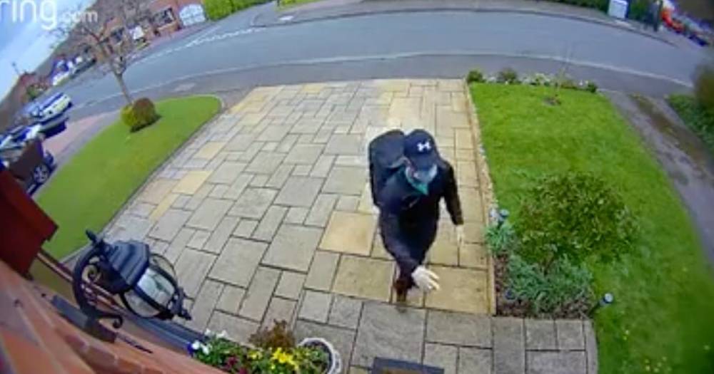 Coronavirus scammer caught on CCTV going door-to-door selling masks and gloves - dailystar.co.uk