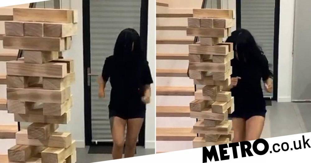 Cardi B losing it while self-isolating and running into a block of jenga is a real mood - metro.co.uk