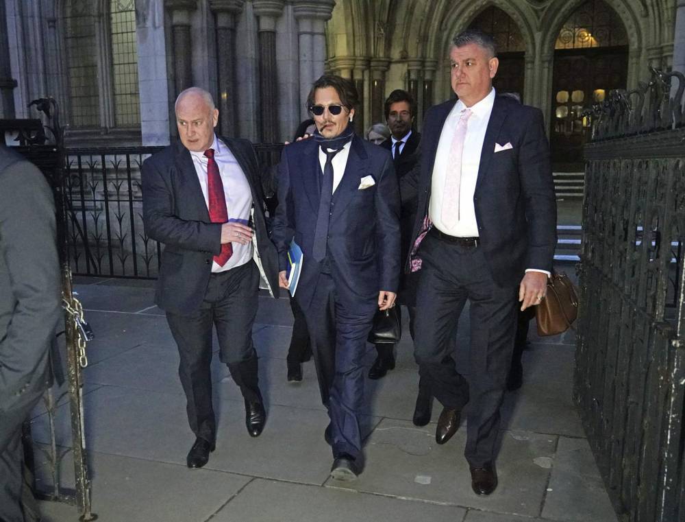 Johnny Depp - Dan Wootton - Amber Heard - Johnny Depp's libel case against UK tabloid stalled by virus - clickorlando.com - Britain - city London