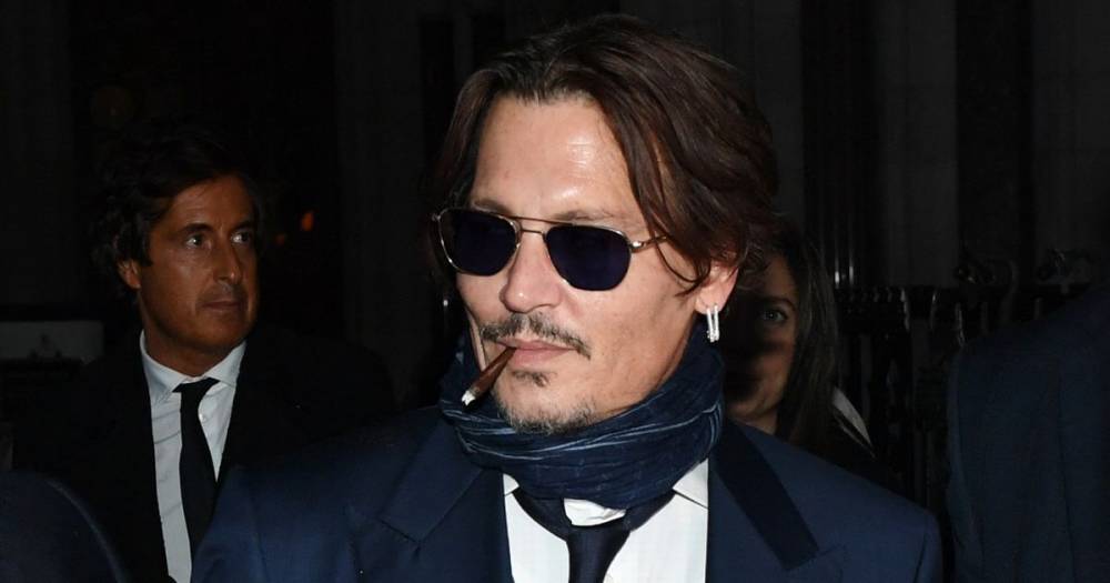 Johnny Depp - Amber Heard - Johnny Depp's libel case suspended over coronavirus after grim text calling Amber Heard 'c**-guzzler' - mirror.co.uk - city London