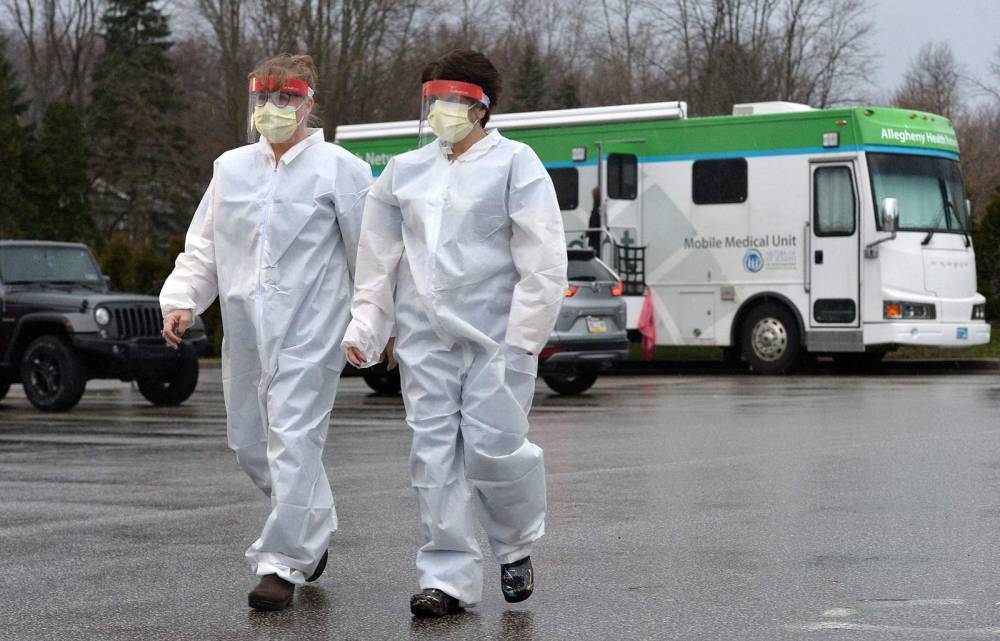 US locking down 70 million people as virus strains Europe - clickorlando.com - New York - China - city Wuhan - Usa - Italy - Spain - Britain - state Illinois - state California