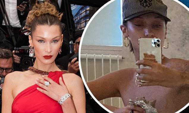 Bella Hadid - Bella Hadid chows down on a burrito in a playful topless photo as she promotes self-distancing - dailymail.co.uk