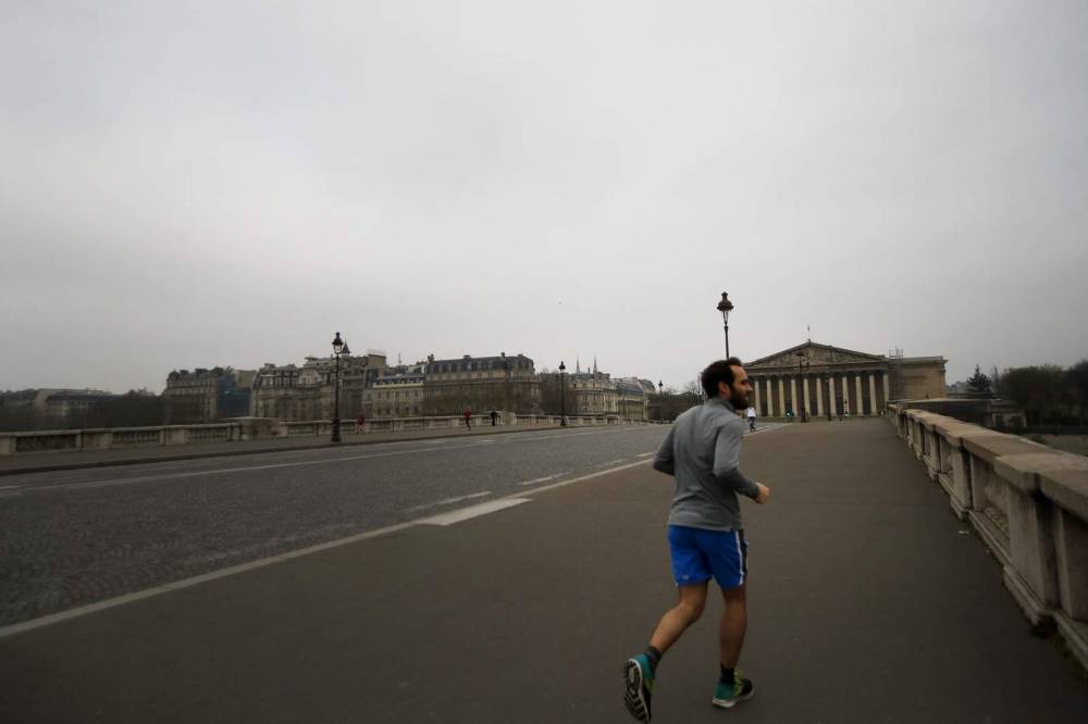 Confined by virus, Frenchman runs marathon on his balcony - clickorlando.com - city Wuhan - France - city Abu Dhabi
