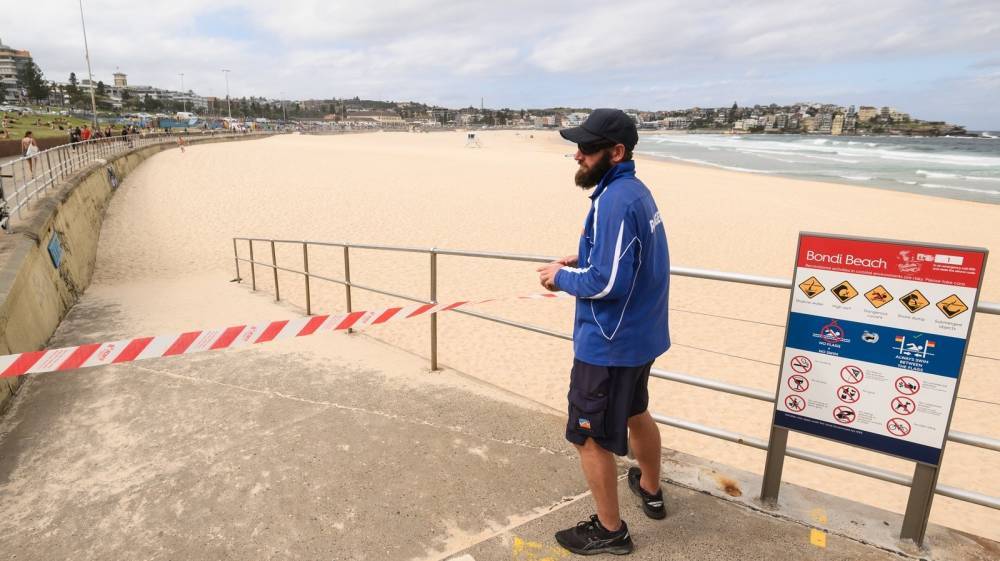 Sydney's Bondi Beach closed after crowds ignore virus warnings - rte.ie