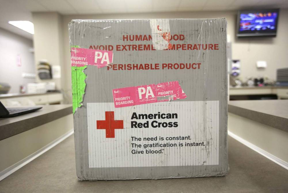 Virus outbreak poses massive challenges for US charities - clickorlando.com - Usa - New York, state New York - state New York - county Cross