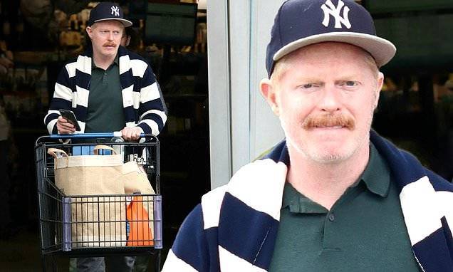 Jesse Tyler Ferguson of Modern Family snags necessities as LA's Safer At Home order goes into effect - dailymail.co.uk - state California - city Los Angeles - Los Angeles, state California - county Tyler - city Ferguson, county Tyler