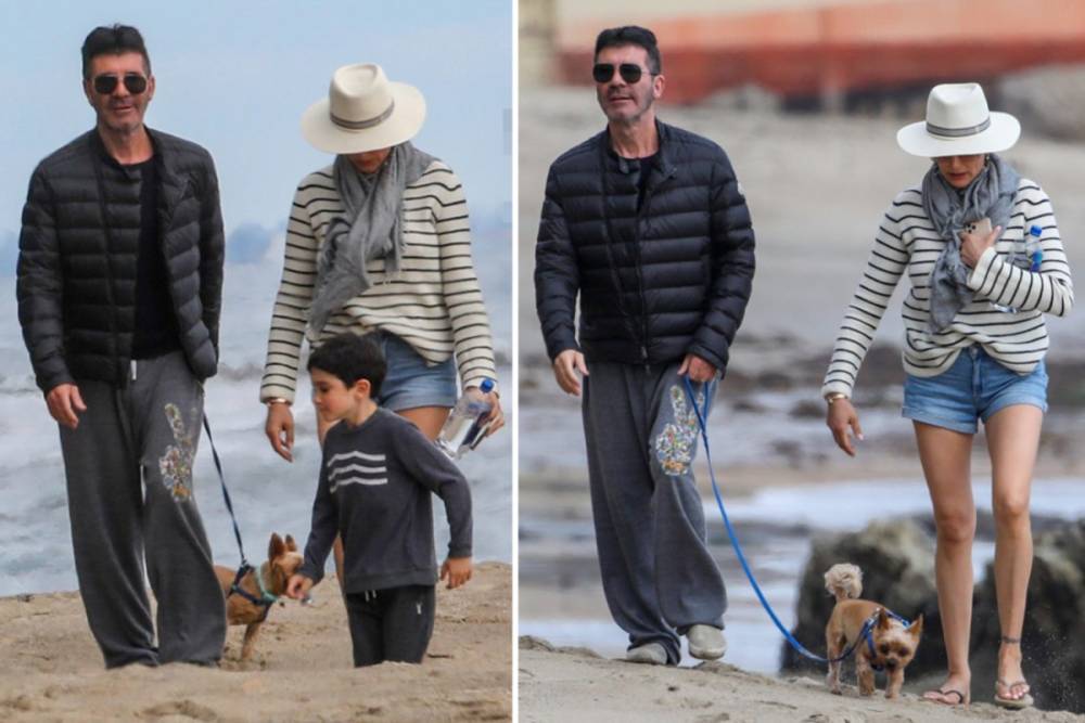 Simon Cowell - Lauren Silverman - Simon Cowell walks his dogs on the beach with Lauren and son Eric amid coronavirus pandemic - thesun.co.uk