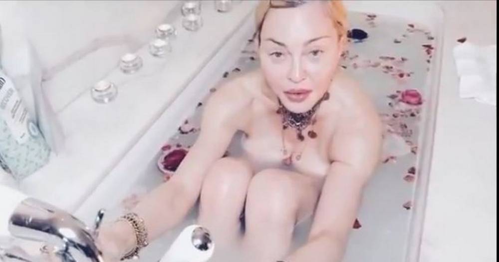 Madonna says coronavirus is 'the great equalizer' in bizarre video of herself nude in the bathtub - manchestereveningnews.co.uk