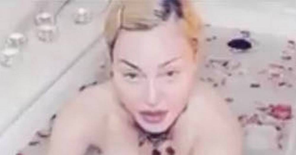 Naked Madonna calls coronavirus ‘the great equaliser’ in bizarre bath video - dailystar.co.uk