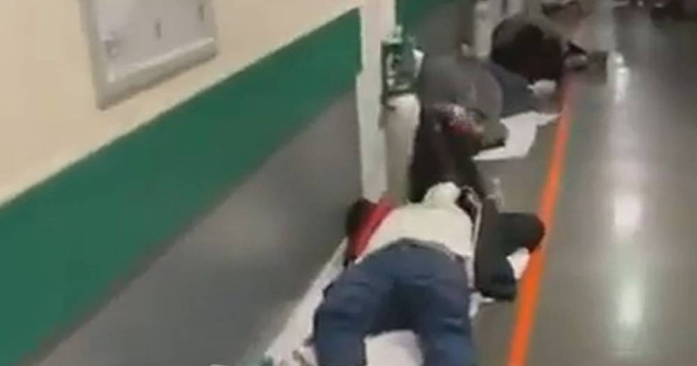 Coronavirus horror as coughing patients forced to lie on hospital floor in Spain - dailystar.co.uk - Spain - city Madrid