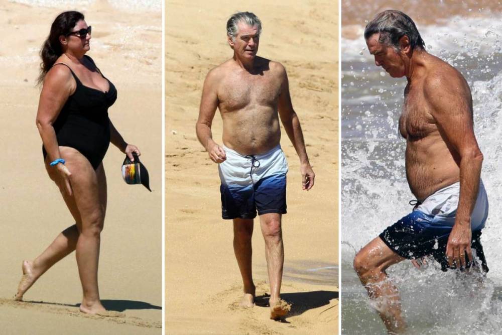 Pierce Brosnan - Pierce Brosnan, 66, makes a splash with James Bond-like exit from the sea on holiday with wife Keely in Hawaii - thesun.co.uk - county Pierce - state Hawaii - county Bond