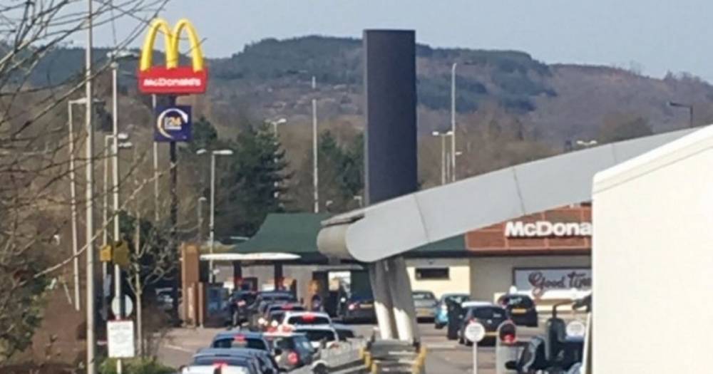 Coronavirus: McDonald's fans queue for 'one last Big Mac' as police are called in - mirror.co.uk - Britain