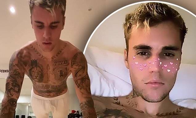 Justin Bieber - Justin Bieber shows off muscular tattooed body as he performs Instagram push-up challenge SHIRTLESS - dailymail.co.uk - Los Angeles