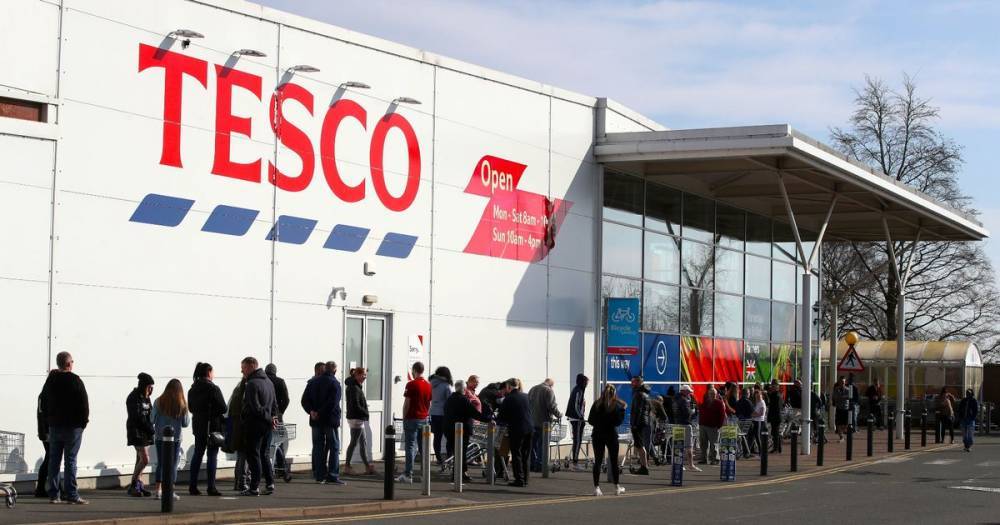 Coronavirus: Tesco to axe skimmed milk and multi-packs to stop panic buying at its stores - dailystar.co.uk - Britain - county Major
