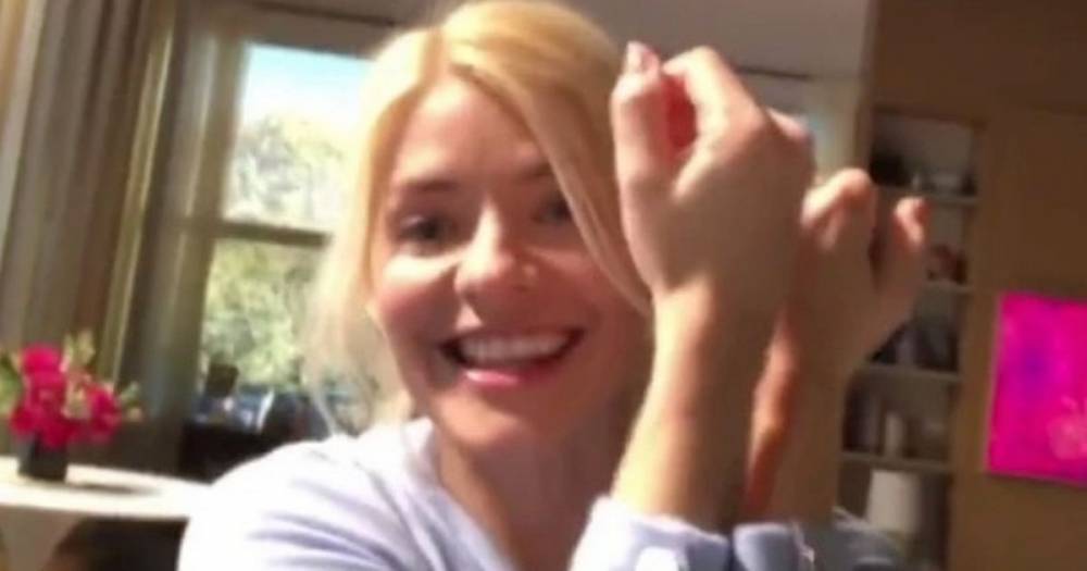 Holly Willoughby - Phillip Schofield - Holly Willoughby shares secret wardrobe malfunction she had live on GMB - dailystar.co.uk - Britain