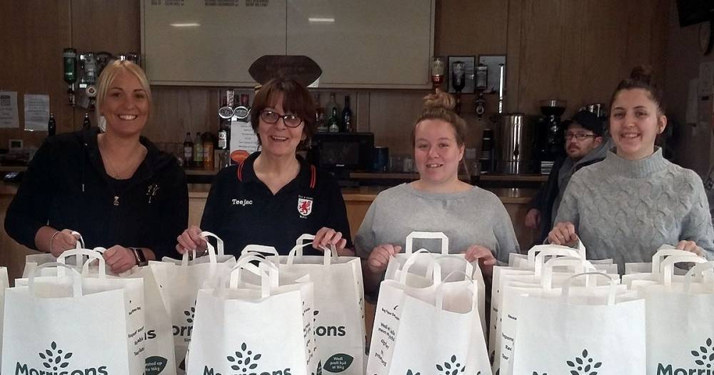 Coronavirus: Hero rugby club staff pack bags full of food to deliver to needy - mirror.co.uk
