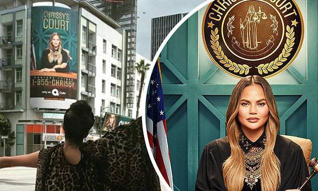 Chrissy Teigen poses in front of her LA billboard 'no one will see' for Quibi show Chrissy's Court - dailymail.co.uk - city Hollywood