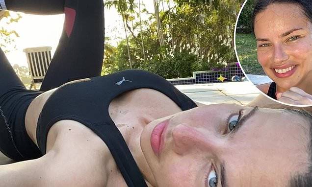 Adriana Lima - Adriana Lima works out in a sports bra in the midst of the coronavirus quarantine - dailymail.co.uk - city Lima