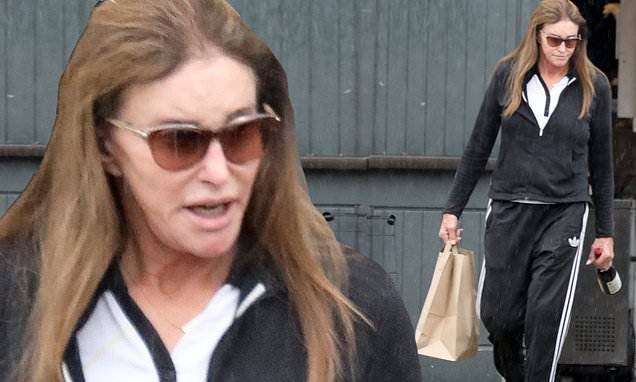 Caitlyn Jenner - Caitlyn Jenner pops out to pick up food to go and wine in Malibu wearing black tracksuit - dailymail.co.uk - Britain - state California - city Malibu