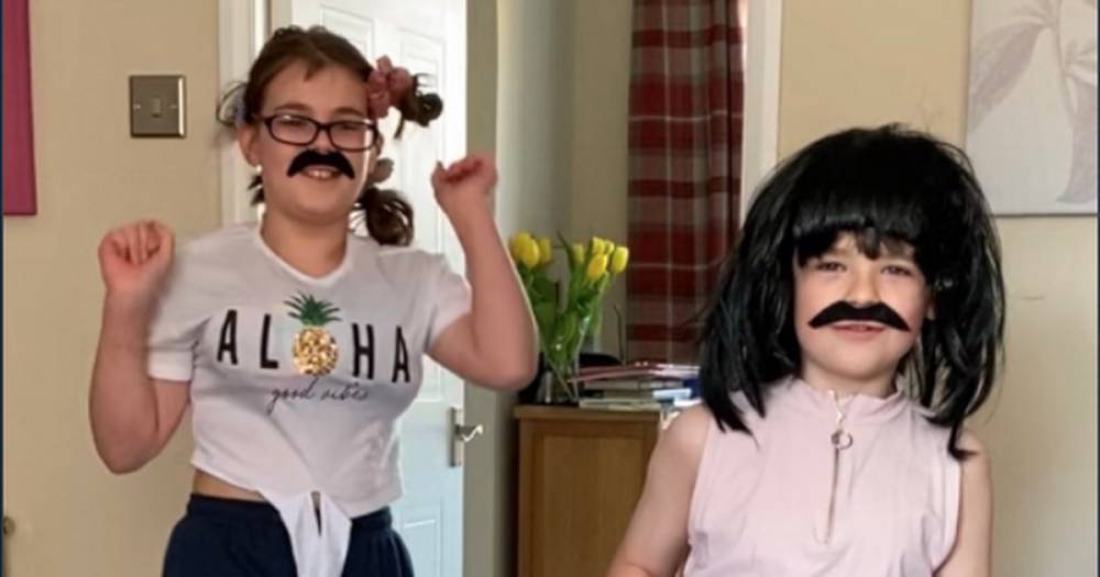 Dad takes home schooling to new level as kids belt out Queen classic in unusual music lesson - dailyrecord.co.uk - Britain