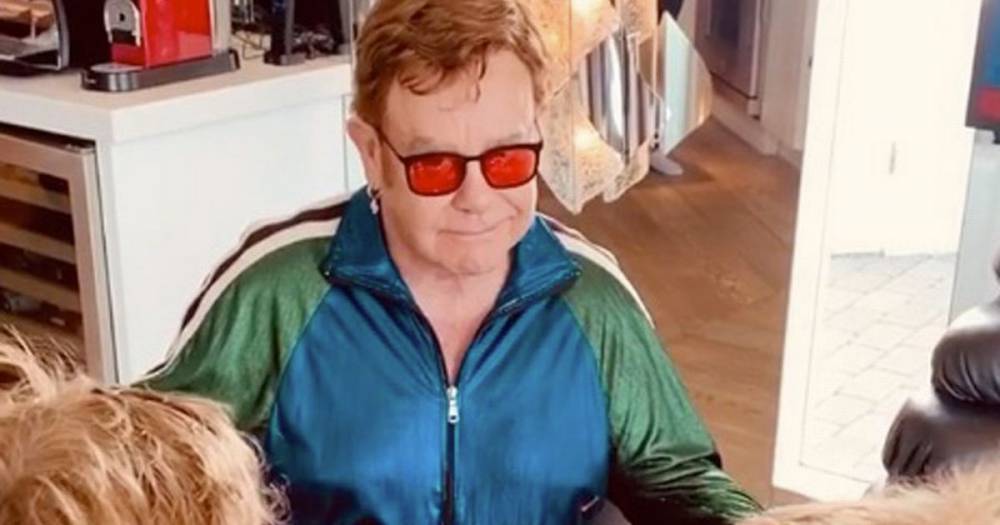Elton John - Elton John celebrates 73rd birthday with family while self-isolating at home - mirror.co.uk