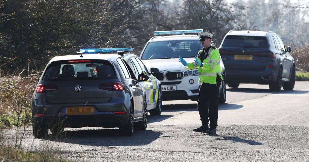Coronavirus: Police stop drivers and threaten £960 fines if journey isn't 'essential' - mirror.co.uk - Britain