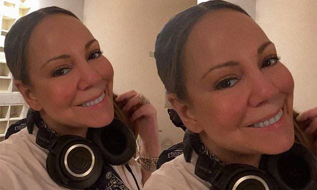 Mariah Carey - Mariah Carey marks her 50th birthday with a fresh-faced Instagram photo and talks about 'a new song' - dailymail.co.uk