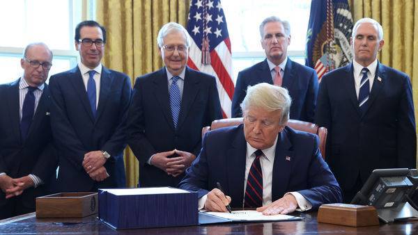 Donald Trump - Donald Trump signs $2 trillion coronavirus bill, largest ever US stimulus - livemint.com - China - Usa