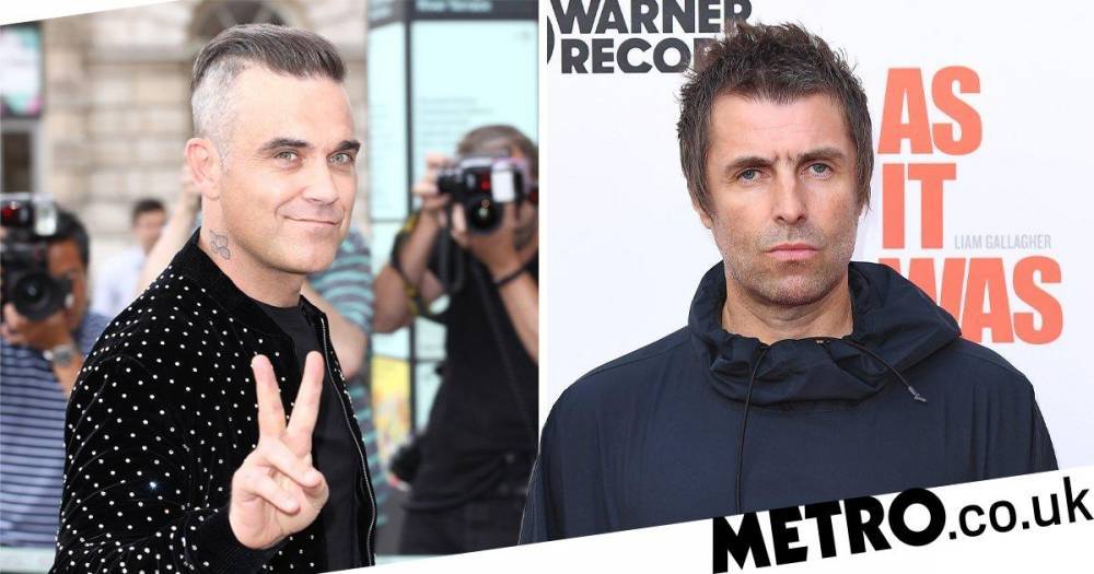 Liam Gallagher - Robbie Williams - Robbie Williams spends quarantine reigniting feud with Liam Gallagher by calling him ‘d**khead’ - metro.co.uk