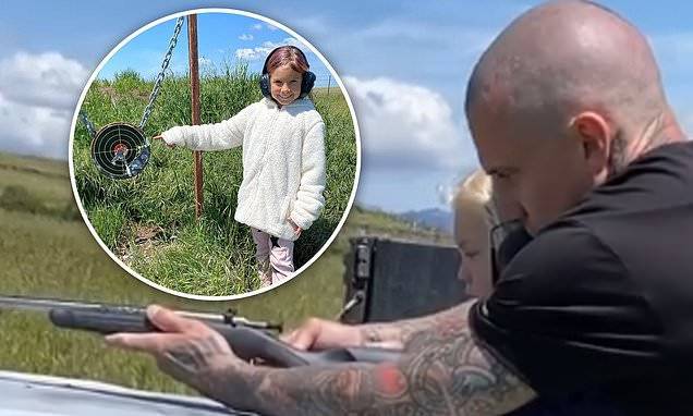 Carey Hart - Carey Hart three-year-old young son and eight-year-old daughter how to shoot air rifles - dailymail.co.uk