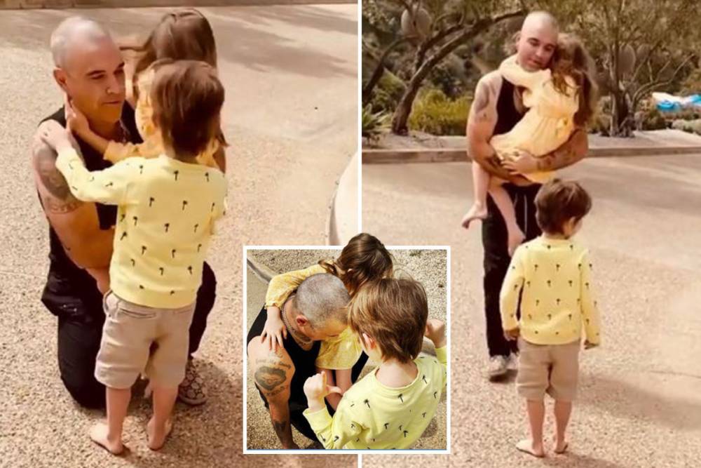 Robbie Williams - Robbie Williams’ kids scream ‘Daddy’ in heartbreaking video as they reunite after his coronavirus quarantine - thesun.co.uk