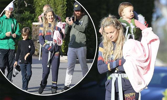 Kate Hudson - Danny Fujikawa - Kate Hudson carries daughter Rani on back during stroll with Danny Fujikawa and her two sons - dailymail.co.uk