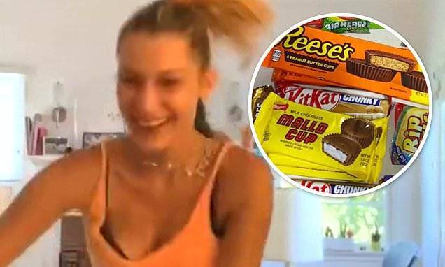 Bella Hadid - Bella Hadid hoards candy and posts another TikTok dance video with quarantine crew in LA - dailymail.co.uk - Los Angeles - Netherlands - city Los Angeles - Palestine