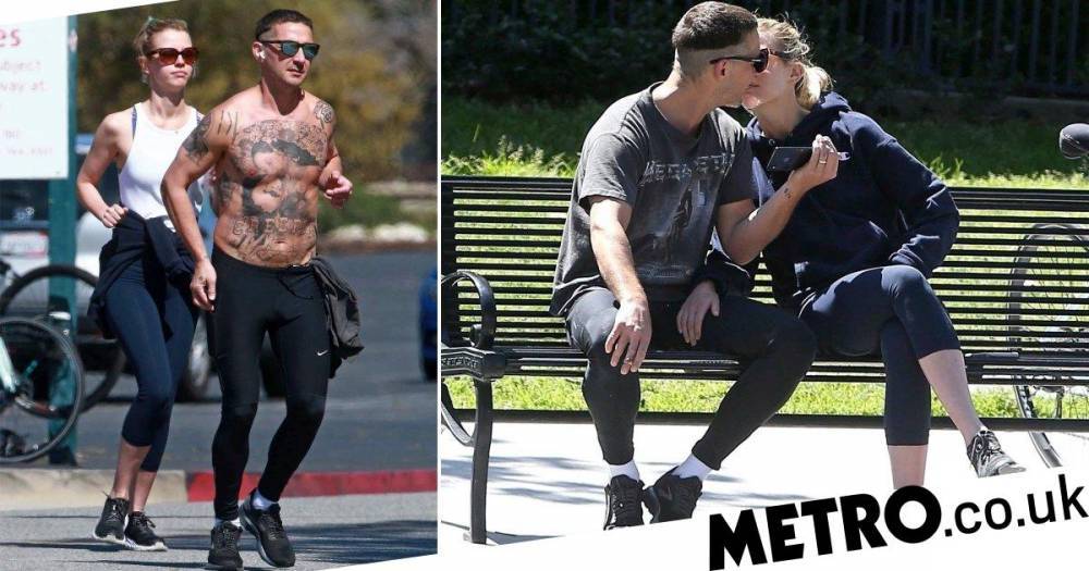 Mia Goth - Shia Labeouf - Shia LaBeouf kisses estranged wife Mia Goth on topless run as they reunite two years after split - metro.co.uk - state California - city Pasadena, state California