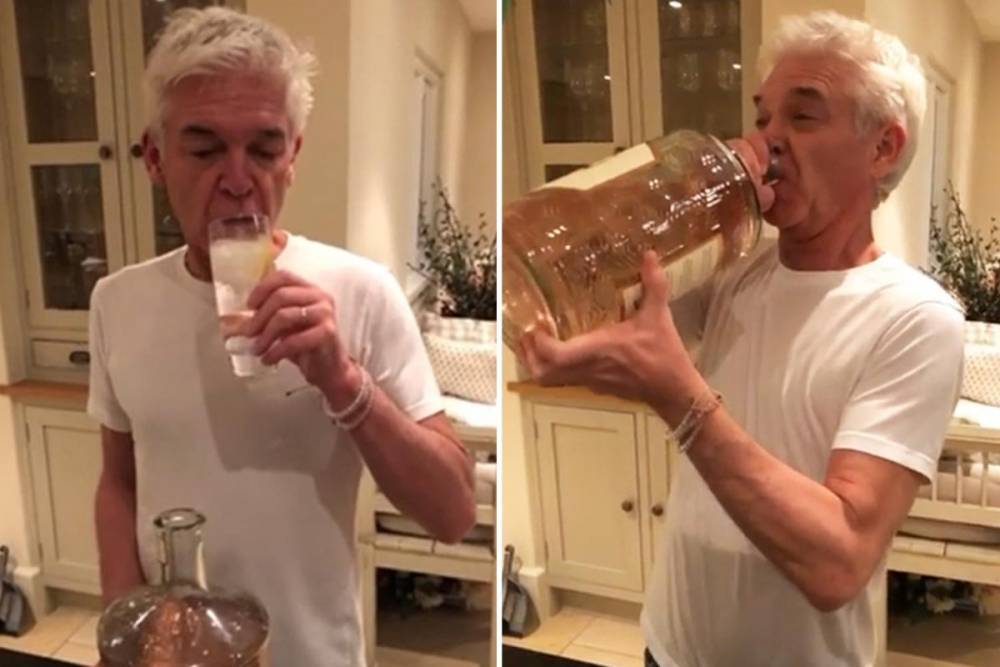 Phillip Schofield - Phillip Schofield swigs from a HUGE bottle of gin during boozy night in at family home - thesun.co.uk
