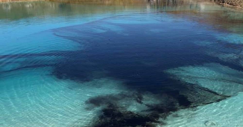Police dye Buxton 'blue lagoon' beauty spot to deter visitors - manchestereveningnews.co.uk - Britain
