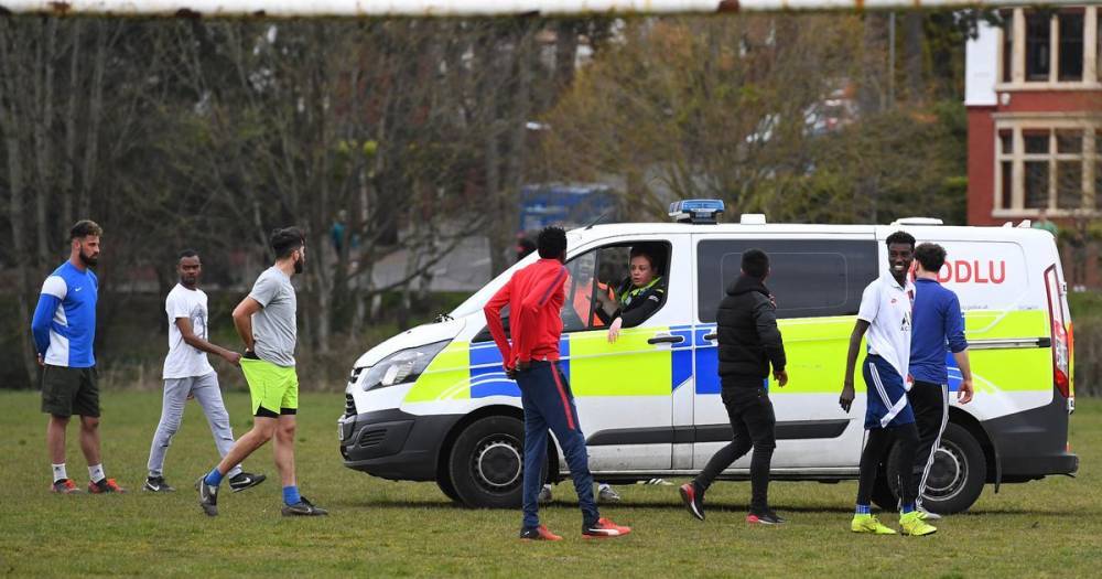 Police break up footballers flouting coronavirus lockdown laws with outdoor game - mirror.co.uk