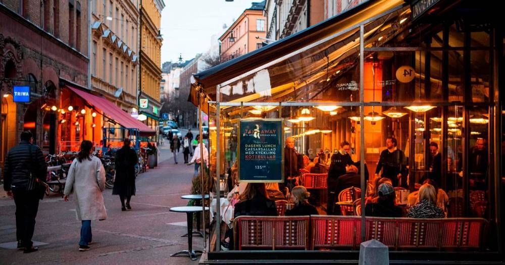 Sweden snubs strict coronavirus lockdown with bars still open as rest of Europe hunkers down - dailyrecord.co.uk - Sweden - city Stockholm