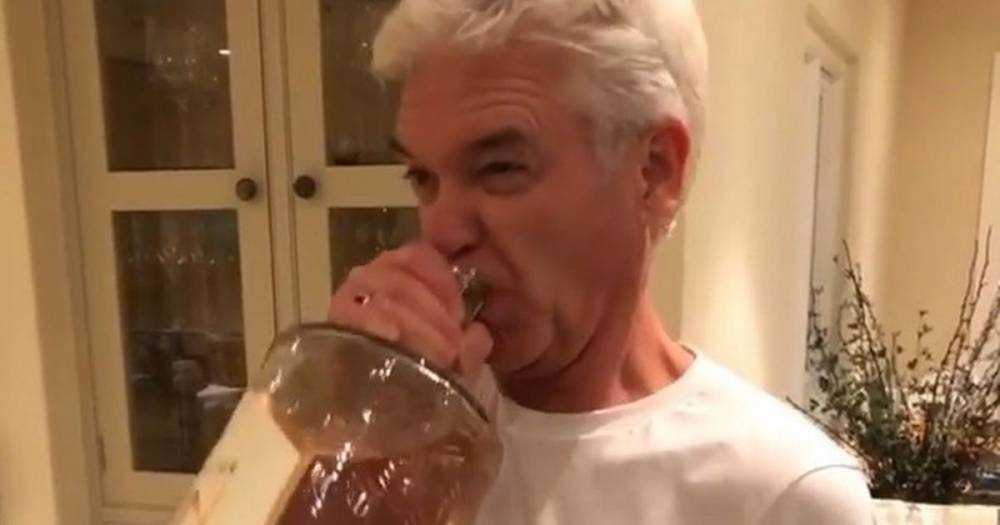 Phillip Schofield - Phillip Schofield says 'f**k it' as he ditches glass of gin for entire bottle - dailystar.co.uk - city Manchester