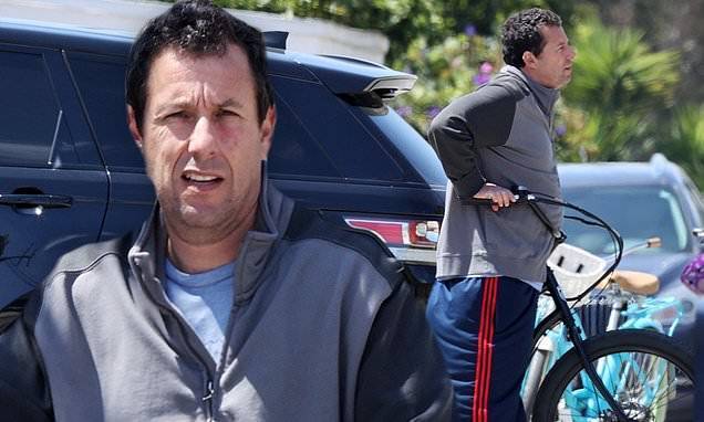 Adam Sandler - Adam Sandler satisfies his need for speed as he takes a break from isolating at home for a bike ride - dailymail.co.uk - city Malibu - city Sandler