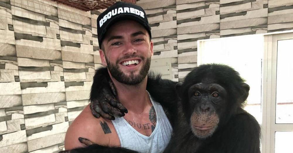 Love Island's Jamie Clayton defends snap of him cuddling a monkey dressed in clothes - mirror.co.uk