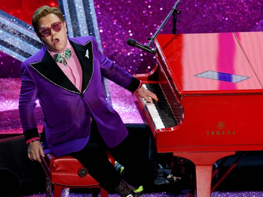 Elton John - Mariah Carey - Alicia Keys - Billie Eilish - Tim Macgraw - Elton John's coronavirus 'living room' show raises $8 million for charities - torontosun.com - Usa - Los Angeles