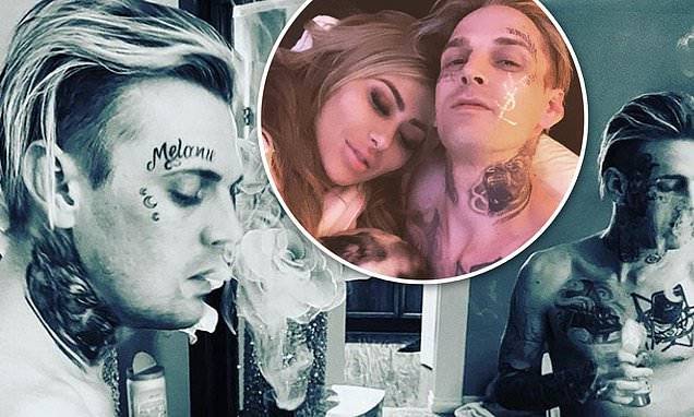 Aaron Carter - Melanie Martin - Aaron Carter says he is single in nude photo featuring ex Melanie Martin's name tattooed on his face - dailymail.co.uk - state California - county Lancaster