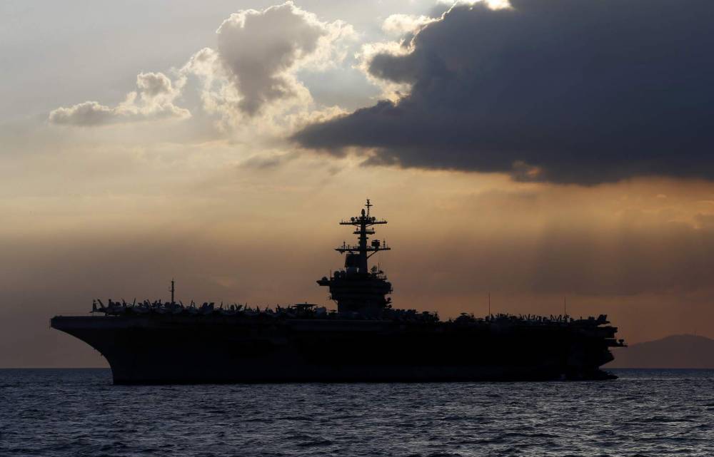 Theodore Roosevelt - US warship captain seeks crew isolation as virus spreads - clickorlando.com - Usa - Washington - Guam